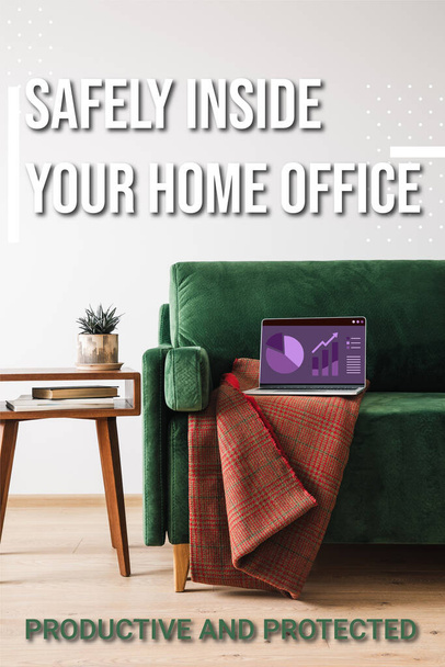 green sofa, blanket and laptop with charts and graphs near safely inside your home office lettering, wooden coffee table with plant and books - Foto, Imagen