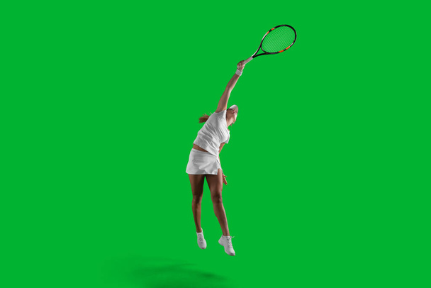 Young girl playing tennis - Foto, Imagen