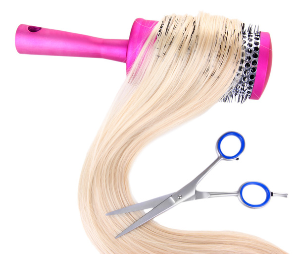 Long blond hair with hairbrush and scissors isolated on white - 写真・画像