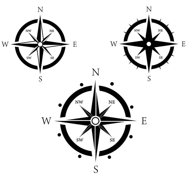 Conjunto de compas con postes Norte, Sur, Este, Oeste signo
.  - Vector, imagen