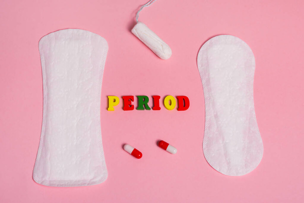 menstruação palavra e tampão
 - Foto, Imagem