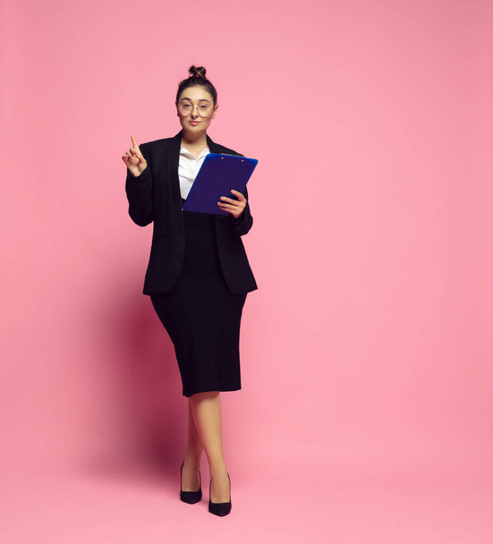 Young caucasian woman in office attire. Bodypositive female character. plus size businesswoman - 写真・画像