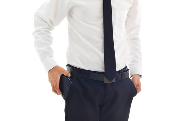 Businessman putting wallet in his pocket isolate on white - Foto, Imagen