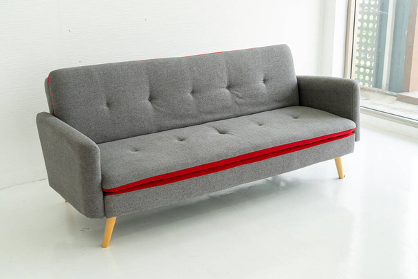 empty grey sofa in living room - Фото, зображення