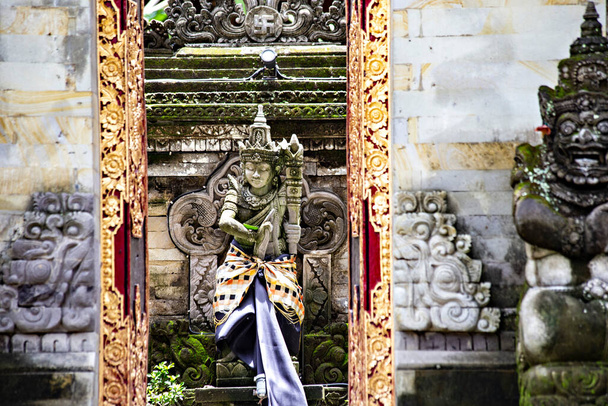 Traditional Balinese architecture details, entrance door in Ubud Palace, Bali, Indonesia - Photo, Image