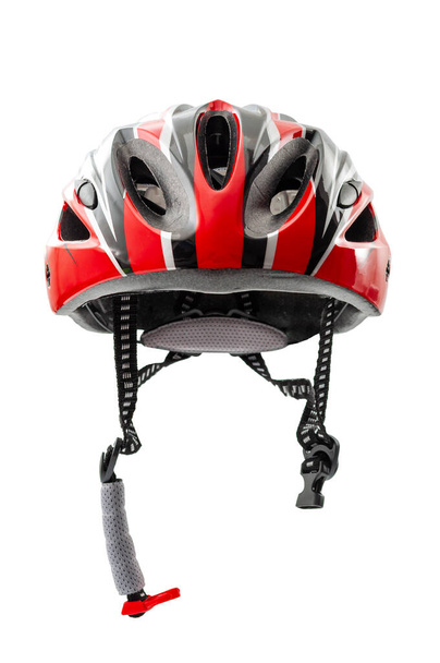 Injury prevention protective cycling  gear and bicycle safety equipment concept with bike helmet isolated on white background with clipping path cutout using the ghost mannequin technique - Photo, Image