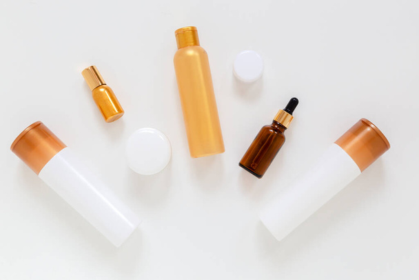 Cosmetic bottles set on the white background - Photo, image