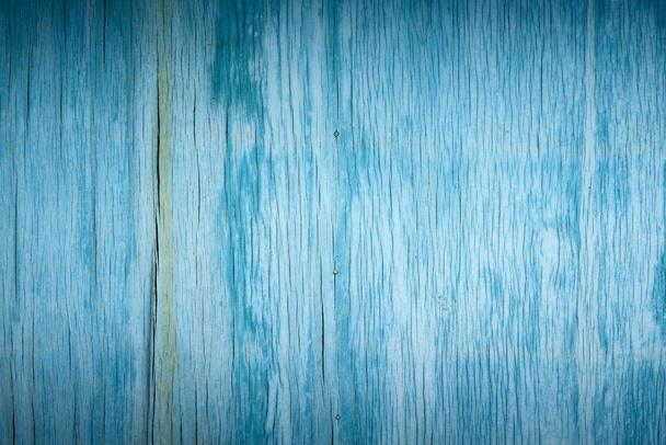 artistic background of old wooden faded cracked plywood painted blue paint - Fotografie, Obrázek