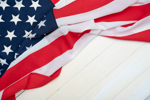 USA flag on wooden table for background - Foto, Imagem