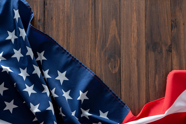 USA flag on wooden table for background - Foto, imagen