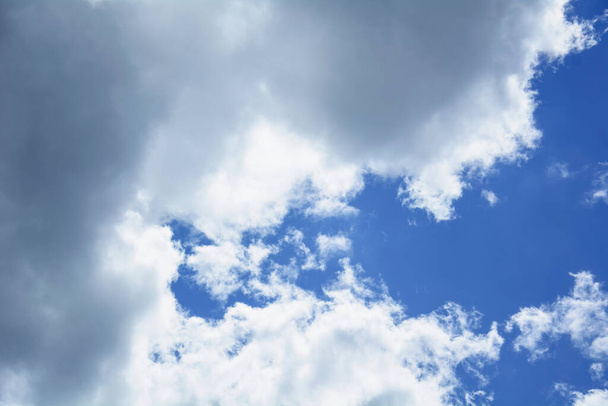 Large clouds on a beautiful blue sky - Fotó, kép
