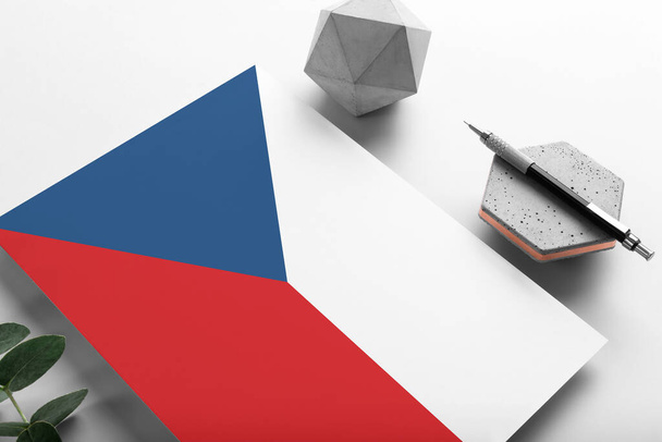 Czech Republic flag on minimalist paper background. National invitation letter with stylish pen on stone. Communication concept. - Photo, Image