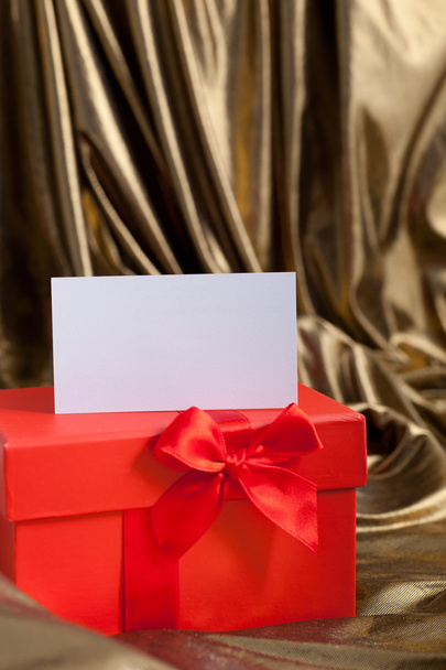 Red Valentines or Christmas gift with a blank tag - Φωτογραφία, εικόνα