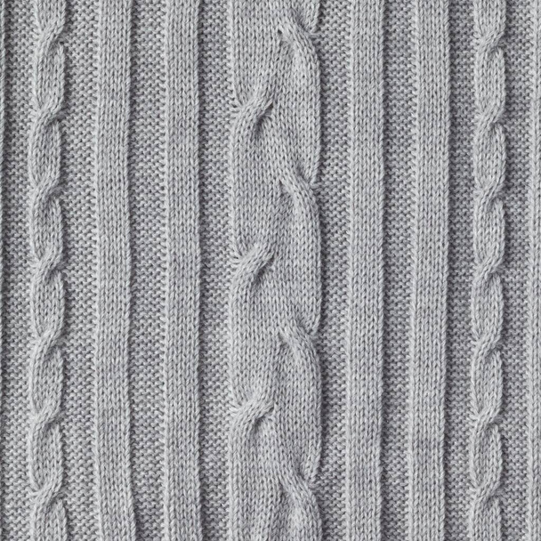 Vzor pro pletení z šedé vlny měkké příze na pozadí - Fotografie, Obrázek