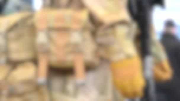 Blurred background. Mannequin dressed various body armor - Footage, Video