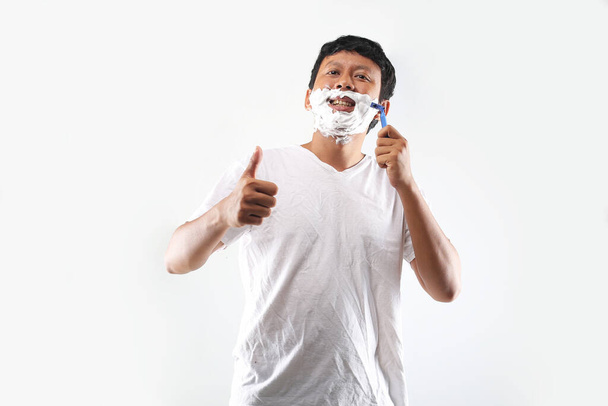 asiatische Mann sauberes Gesicht. Mann rasiert asiatisch - Foto, Bild
