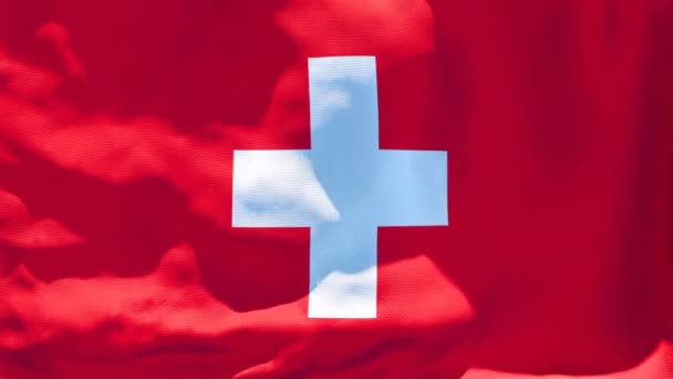 Sveitsin lippu lepattaa tuulessa - Materiaali, video