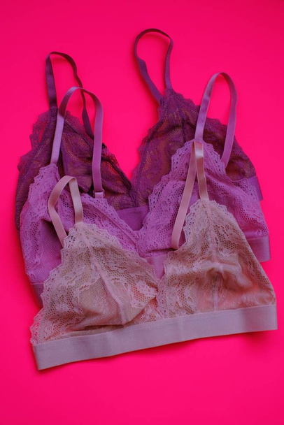 Bra set on a pink background. Women's underwear - Fotoğraf, Görsel