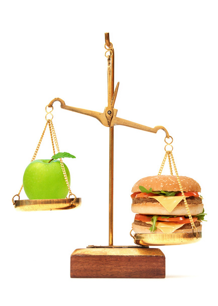 Diet choice between apple and burger - Фото, зображення