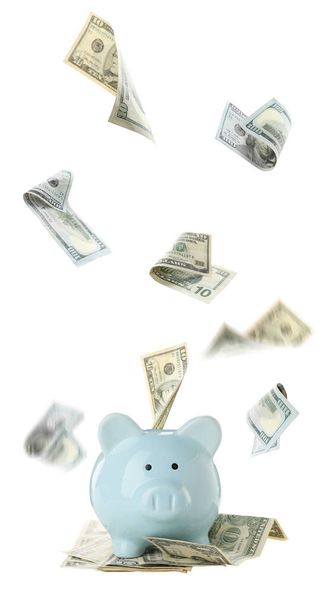 Piggy bank with flying money on white background - Фото, зображення
