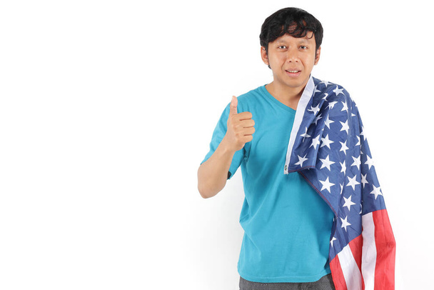 man holding usa flag with hand gesture thumb ok isolated - Photo, Image