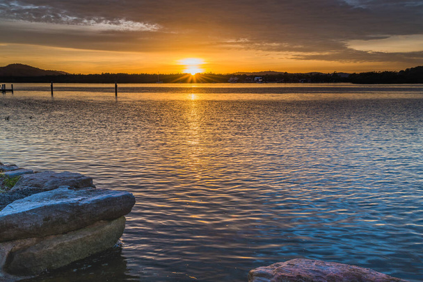 Sunrise Waterscape with Clouds at Woy Woy Waterfront on the Central Coast, NSW, Australia. - Fotó, kép