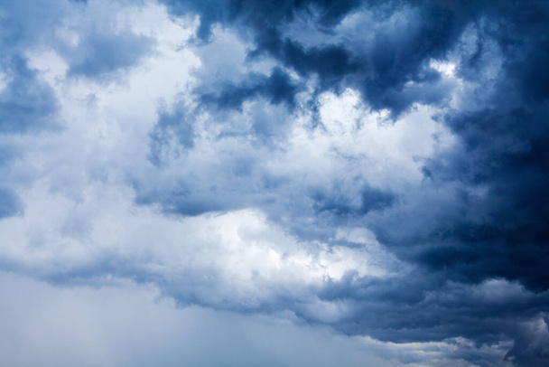 Stormy cloudy sky closeup, dark blue thunderclouds, white cumulus clouds, rainy thunderstorm landscape, overcast bad weather, cloudiness skies panorama, fluffy cloudscape, atmosphere, heaven view, air - Photo, Image