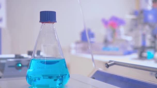 Orbital shaker for mixing, shaking, blending biological samples in plastic flask - Footage, Video