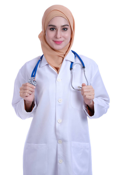 Confidence of young Muslim woman doctor with stethoscope and white doctor coat - Foto, immagini
