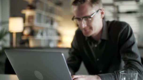 Young Man Freelancer Using Laptop Online Working From Office In Internet, Smiling Focused Millennial Guy Typing On Computer Surfing Web Looking At Screen Enjoying Distant Job - Footage, Video