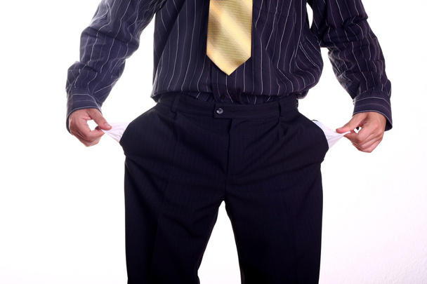 άνθρωπος τραβώντας άδειες τσέπες - Φωτογραφία, εικόνα