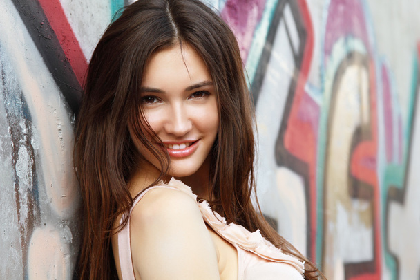 Portrait of smiling beautiful girl - Фото, изображение