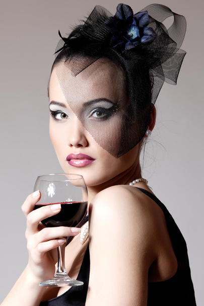Woman in veil with wine - Photo, image