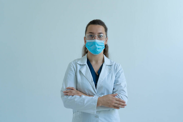 Doctor in the hospital, white wall - Fotó, kép