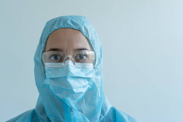 Portrait of a doctor in a protective suit, covid19 - Fotoğraf, Görsel