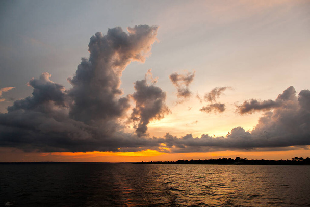Sunset on Amazon river - Photo, Image