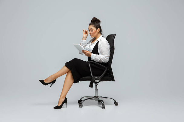 Young caucasian woman in office attire. Bodypositive female character. plus size businesswoman - Fotografie, Obrázek