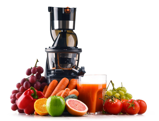 Slow juicer with organic fruits and vegetables isolated on white. Detox diet - Photo, Image