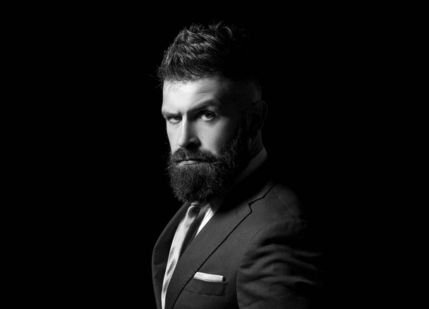 Rich man model. Business man concept. Businessman in dark grey suit with long beard. Man in classic suit, shirt and tie. - Foto, imagen