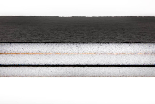 Teflon-coated sound insulation board. Ethylene Vinyl Acetate foam sheets (EVA).  - Photo, Image
