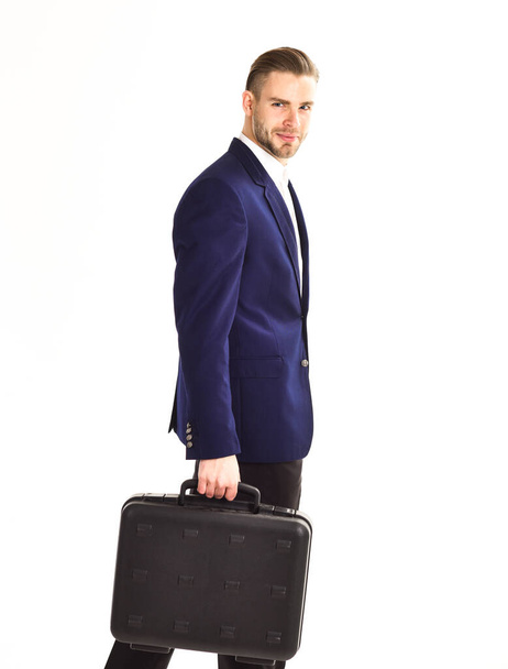 Man carries black case in hand. Business people concept. - Foto, afbeelding