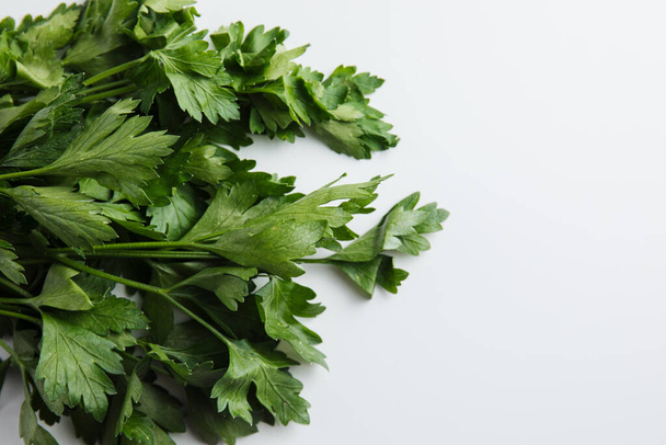 Parsley on a white background. Minimum concept - Foto, afbeelding