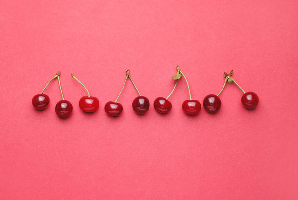Ripe sweet cherry on color background - Foto, Imagem