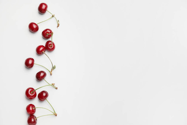 Ripe sweet cherry on light background - Photo, image
