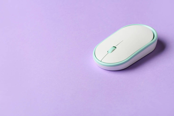 Modern computer mouse on color background - Photo, Image