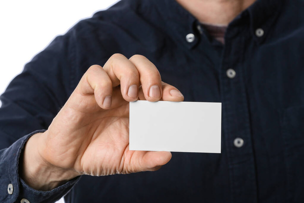 Man with blank business card, closeup - Photo, Image