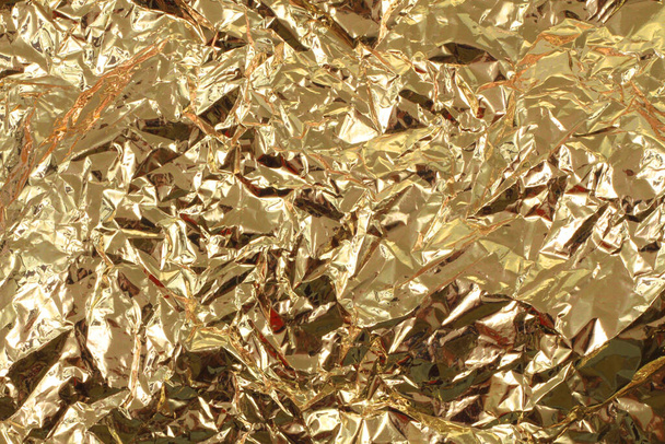 gold metal foil texture as very nice background - Photo, Image