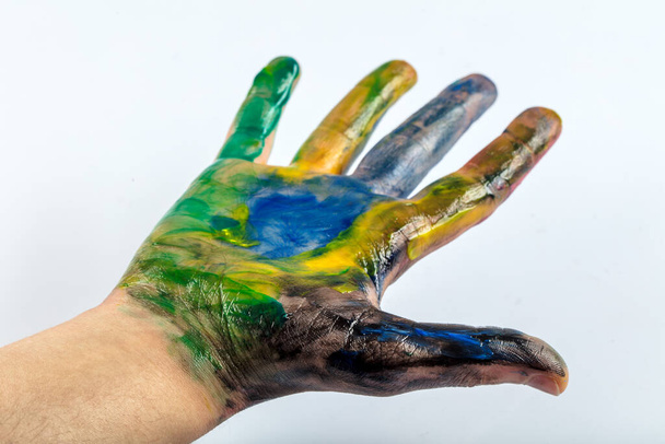 close-up view of human hands painted in colorful paints - Fotoğraf, Görsel