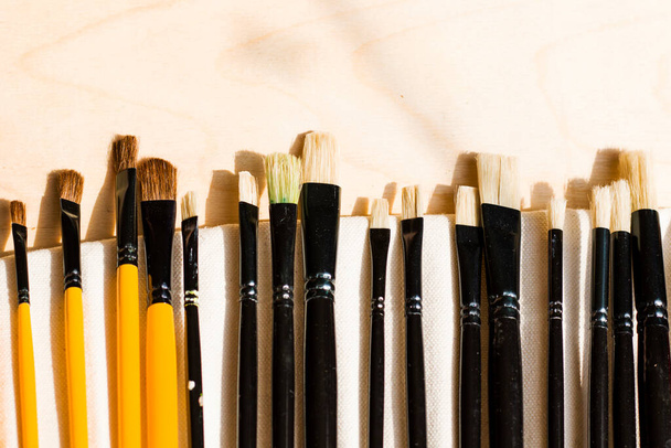 Paint brushes set, close-up. Marketing photo. white background, Studio shot.On the table. - Fotoğraf, Görsel