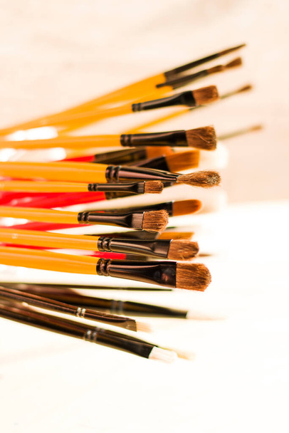 Paint brushes set, close-up. Marketing photo. white background, Studio shot.On the table. - Foto, Imagen